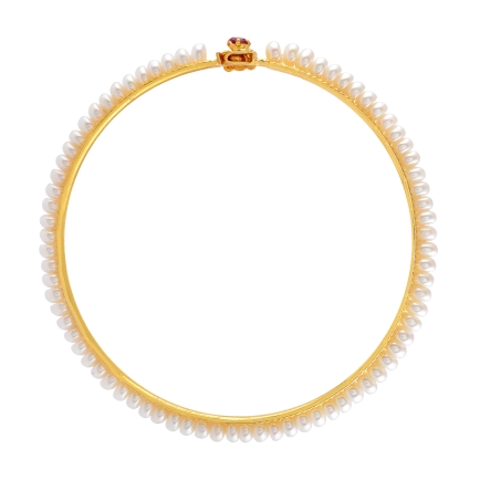 Bangles are studded with pretty white pearls