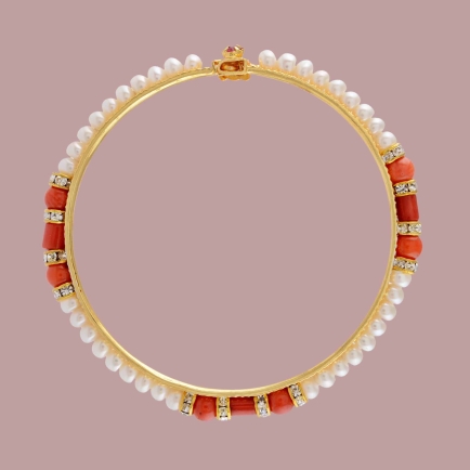 The bangles are studded with pretty white pearls | JB0698